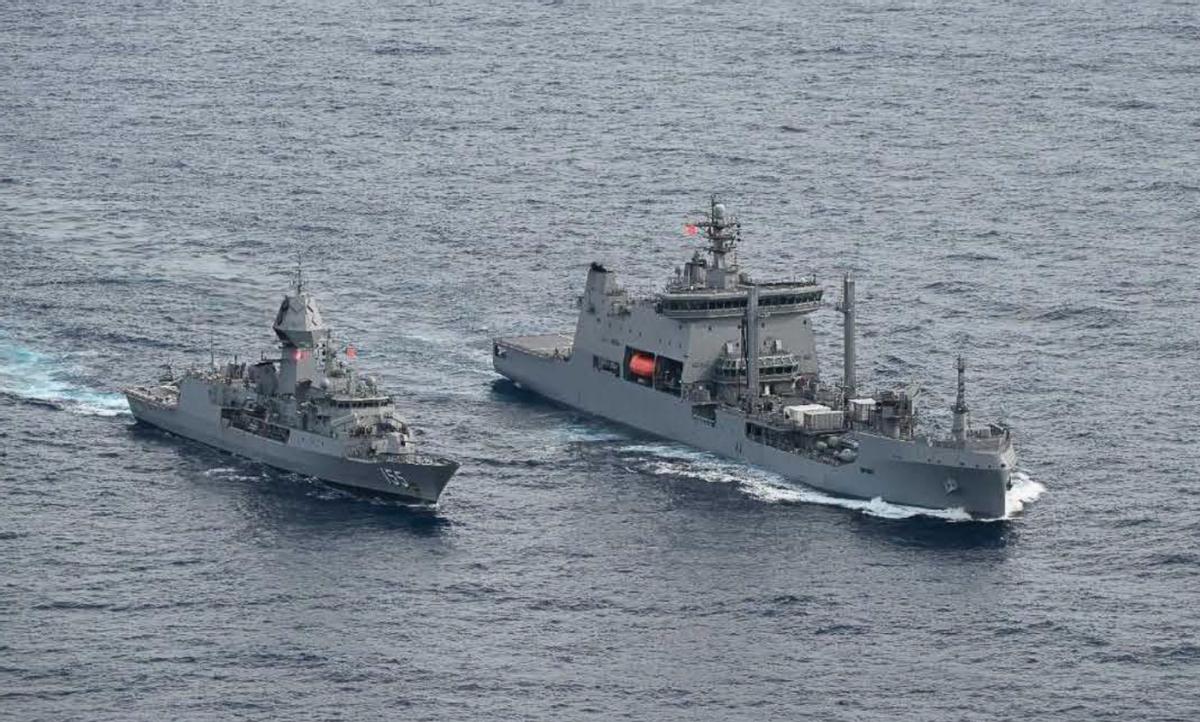 中国无人机飞越演习海域，近距离监视四国军舰，实战化协同成常态中国的无人机飞越