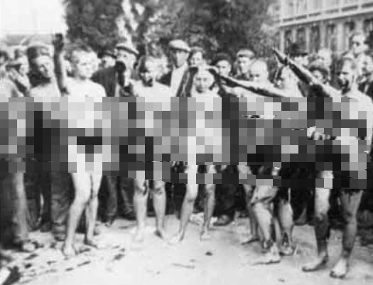 1945年，法国人伊娃，被人扒掉衣服，捆着双手双脚，在大街上迎接“法国人民”的愤