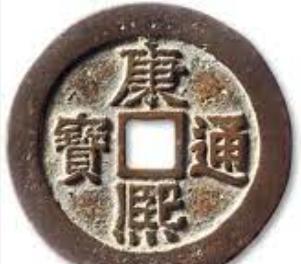 1998年，甘肃定西，一农妇将土豆粉条挂在屋檐铁丝上晾晒，突然，“咔嚓”一声，房