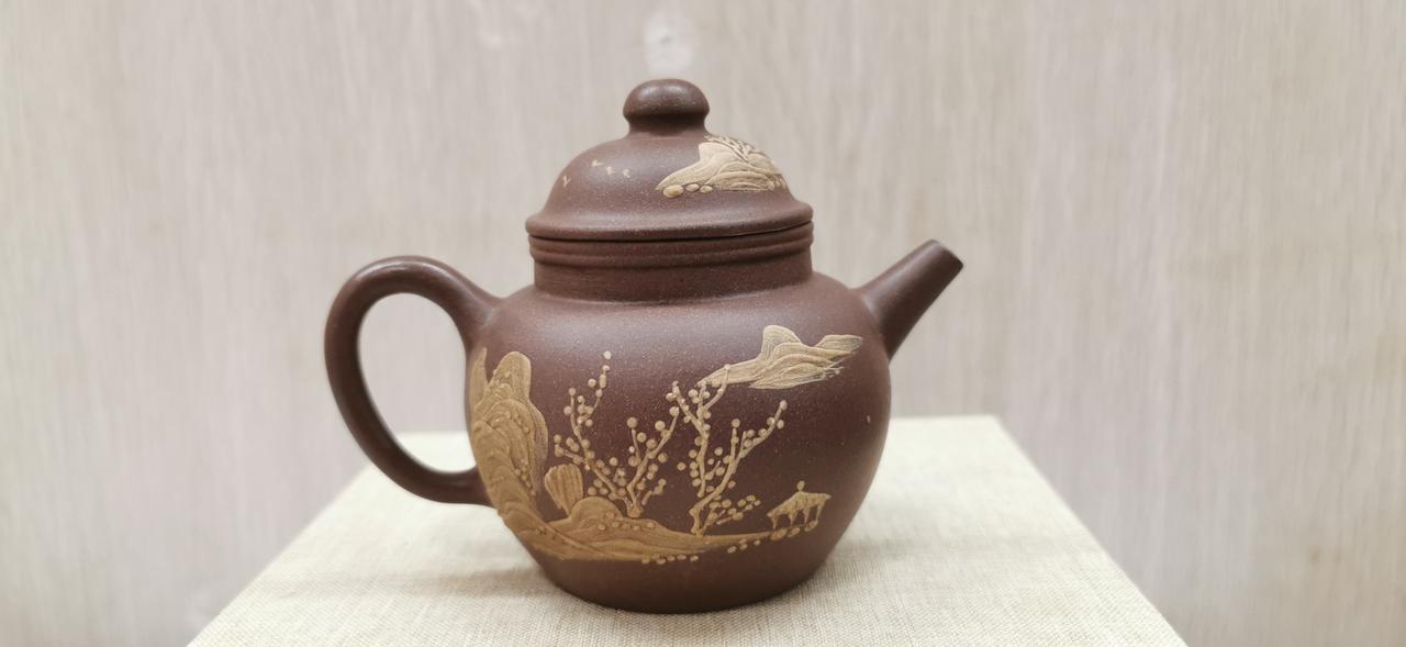 早期中国宜兴龙印系列精品紫砂茶壶（独孔、约150cc）好的紫砂壶是怎样的?这个紫