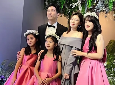 贾静雯一家五口盛装出席萧敬腾婚礼现场,大女儿的鼻环,舌环和嘴唇环也不带了