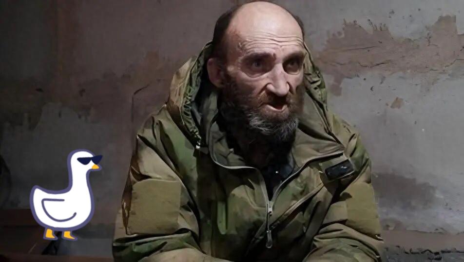 阿夫迪夫卡的废墟上，尘土还在炮火后的空气里漂浮，几十个乌军士兵举着白旗，一步步从