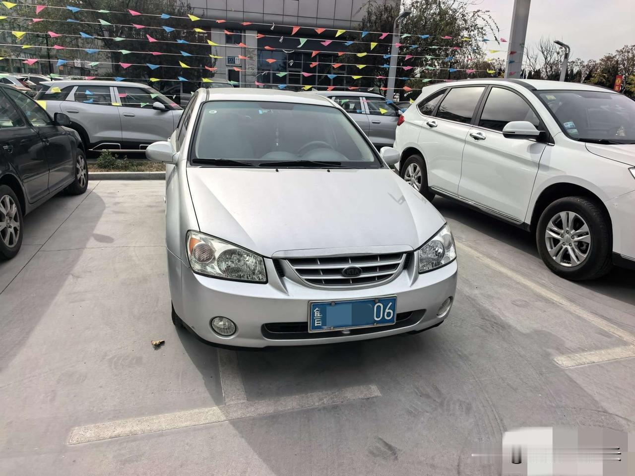 起亚赛拉图报废换BYD，你说可笑吧？车主说：我这车2005年上牌，起亚赛拉图，