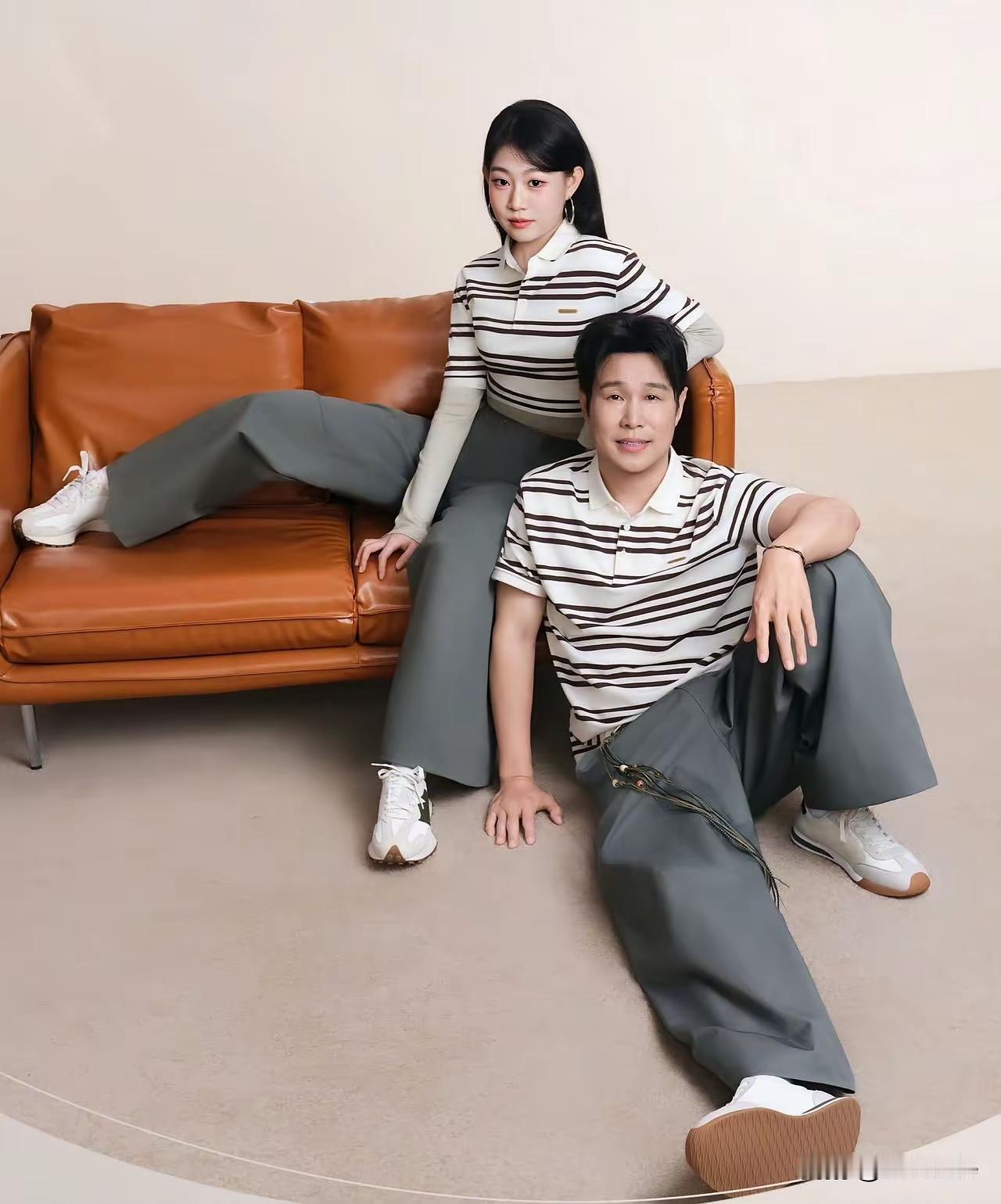 虽然不算什么美女，但是孩子和父亲在一起的写真照，让人看着特舒服，比那些花枝招展的
