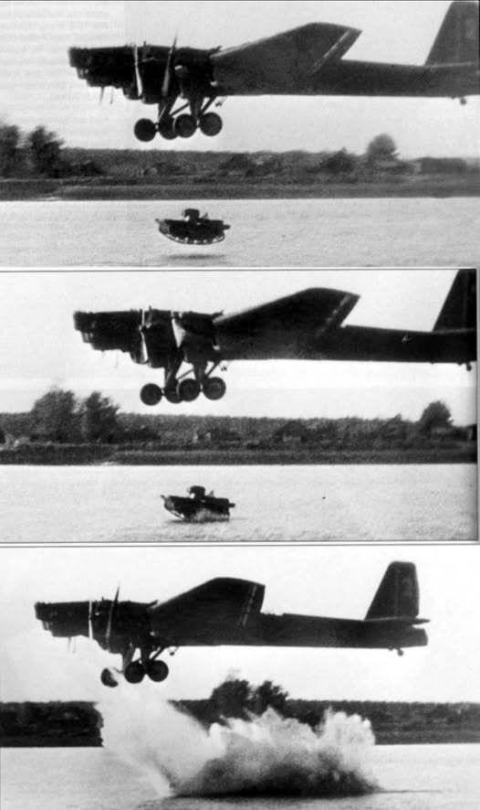 一架苏联TB-3轰炸机将一辆T-37轻型坦克空投到湖中。当时苏军正在研究能否在不