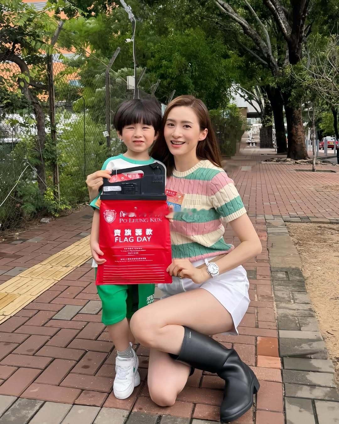 沈卓盈带儿子参加公益活动​​​
