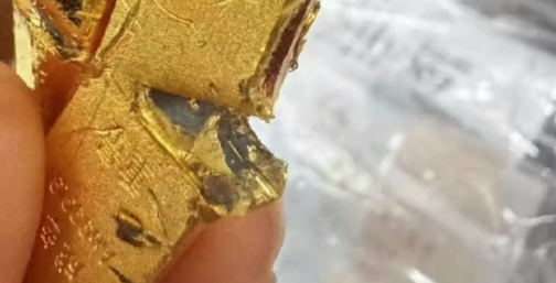 视频疯传! 有消费者在银行买到“掺假金条”?