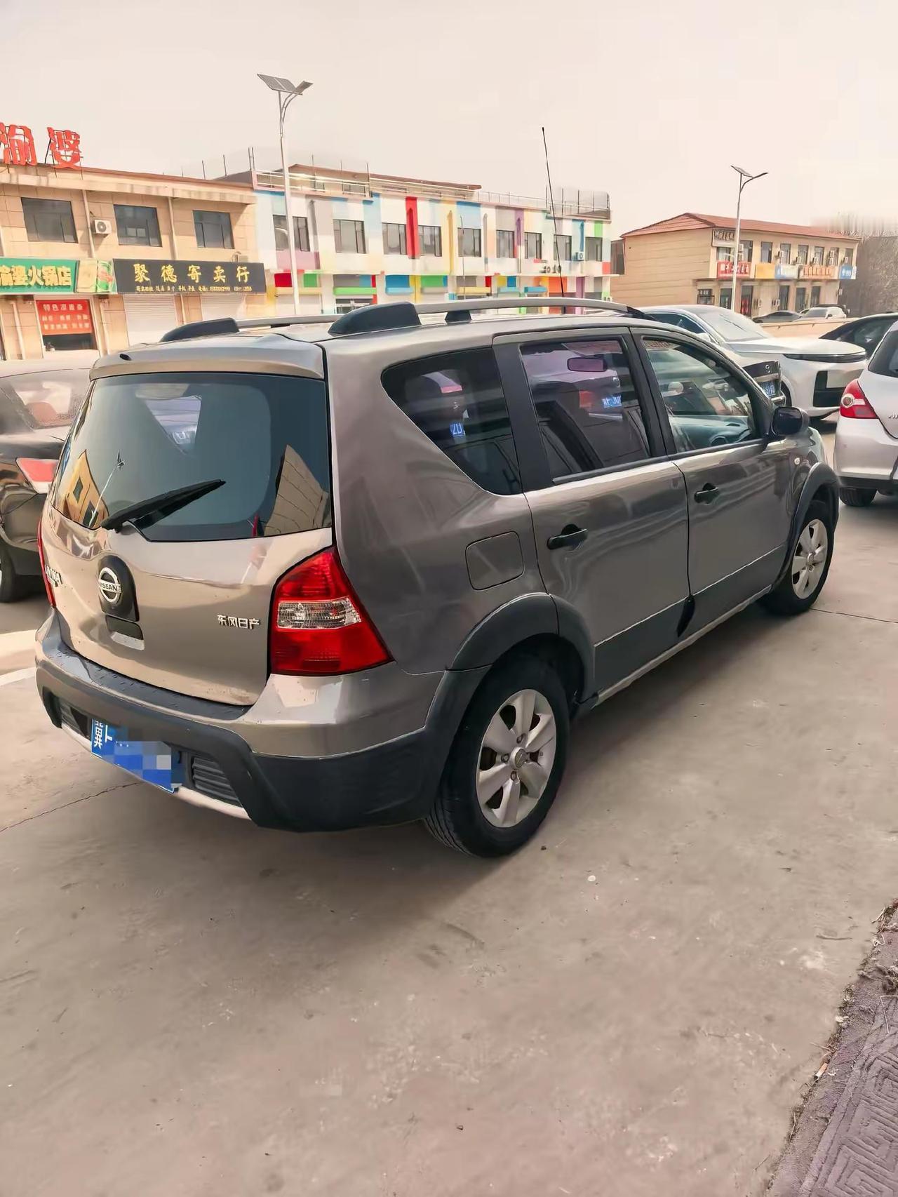 新到13年早产两天日产骊威，自动1.6排