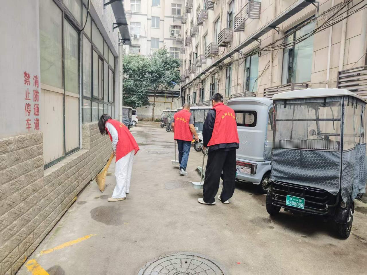 分享一下你随手拍下的照片汝阳县民政局志愿者文明共建走进小区