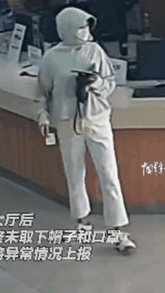 湖北一女子“全副武装”，进入派出所办理业务，其偷偷摸摸行为引起一旁辅警注意，上报