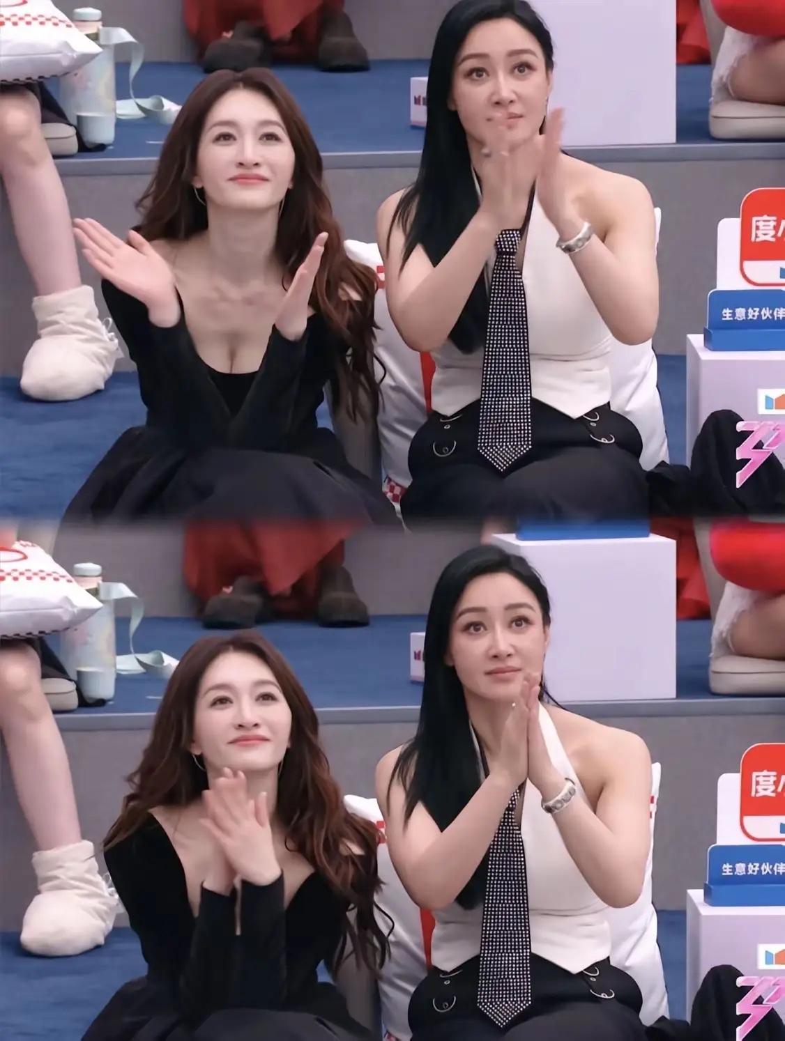 我一开始怀疑是光线的问题，后来又觉得是黑色礼服衬得肤色更亮，直到看清镜头才彻