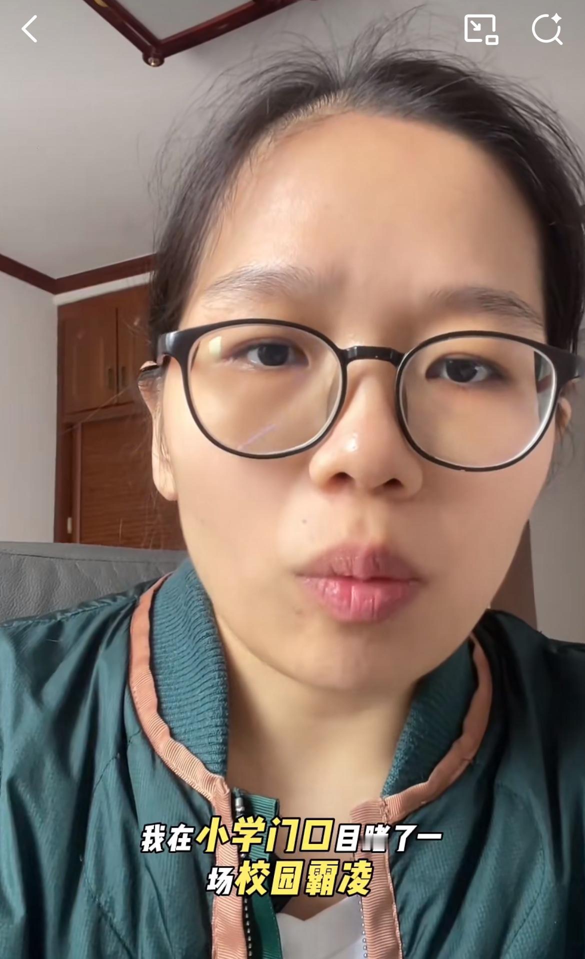 河南一家长校门口发现一个学生欺负另一个学生的霸凌事件，拍照片向学校反馈，学校却说