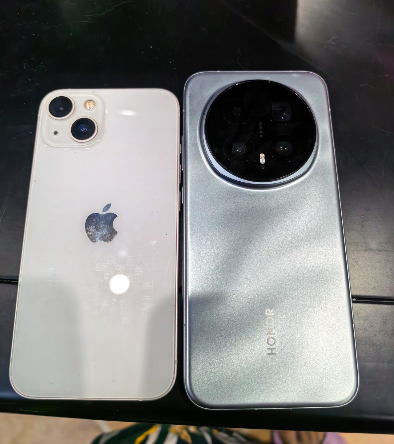 iPhone13换到荣耀Magic8Pro真实体验感受1、居中圆形镜头De