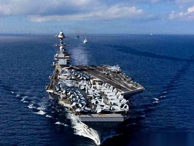 战鼓都敲到家门口了，航母、飞机、连机场港口的攻击清单都给你扒出来了。全世界都以