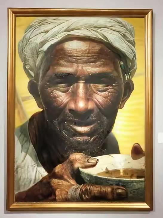 罗中立教授的《父亲》，我们中国人公认的中国的“父亲"形象；画布上的老人，皮