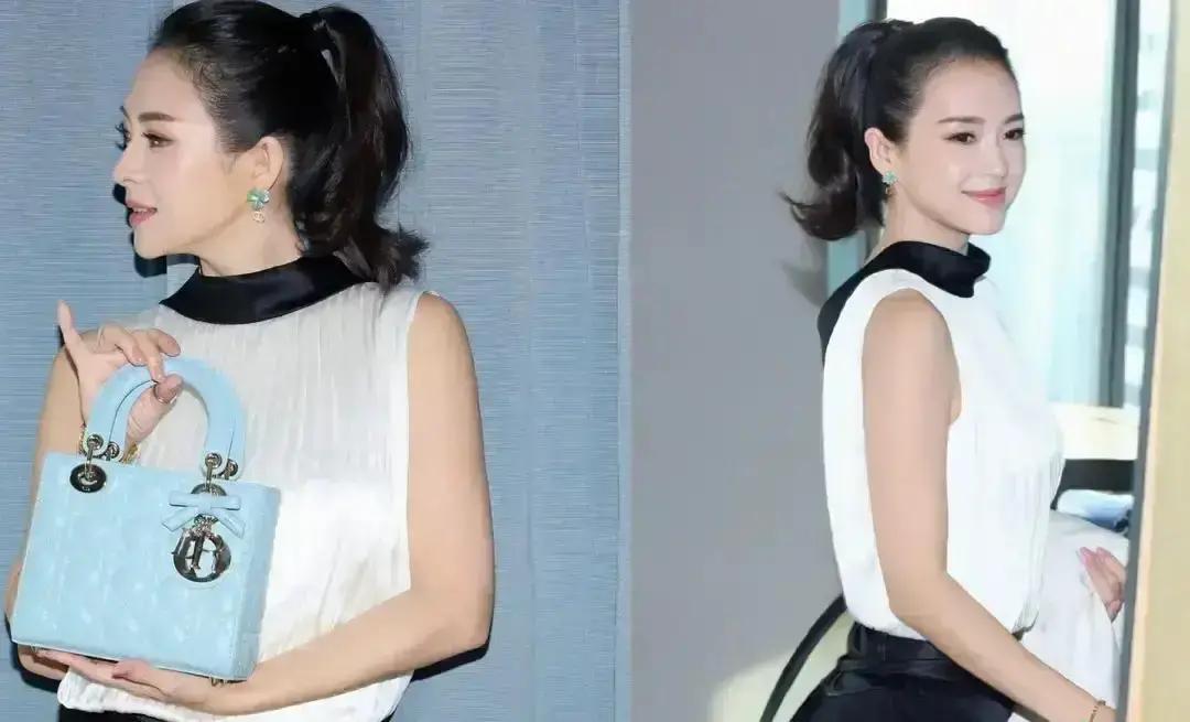 章子怡一现身迪奥，弹幕直接刷屏：姐杀疯了！黑白套装+高马尾，利落得像刚签完