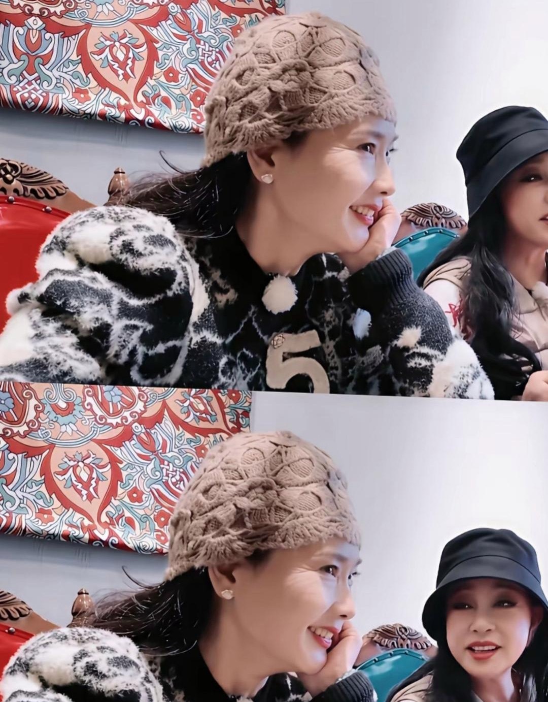 何赛飞不皱眉时候挺慈眉善目，表情严肃时候真的好像学校里的教导主任。看过她的作品，