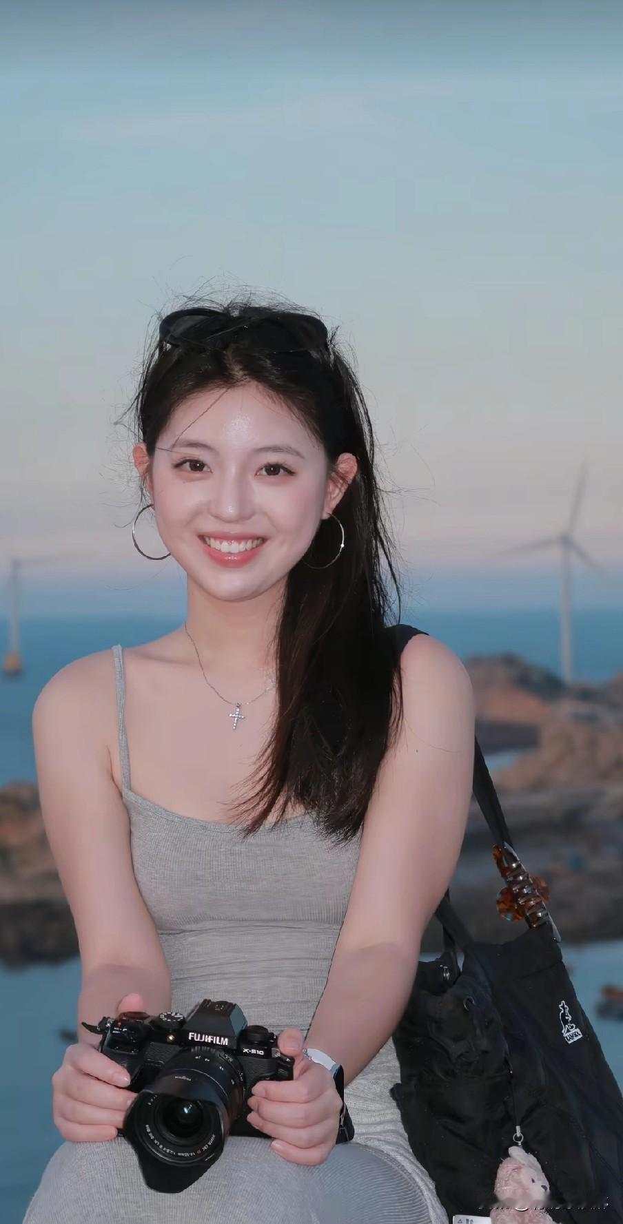 海边日落，手持相机，记录美好瞬间