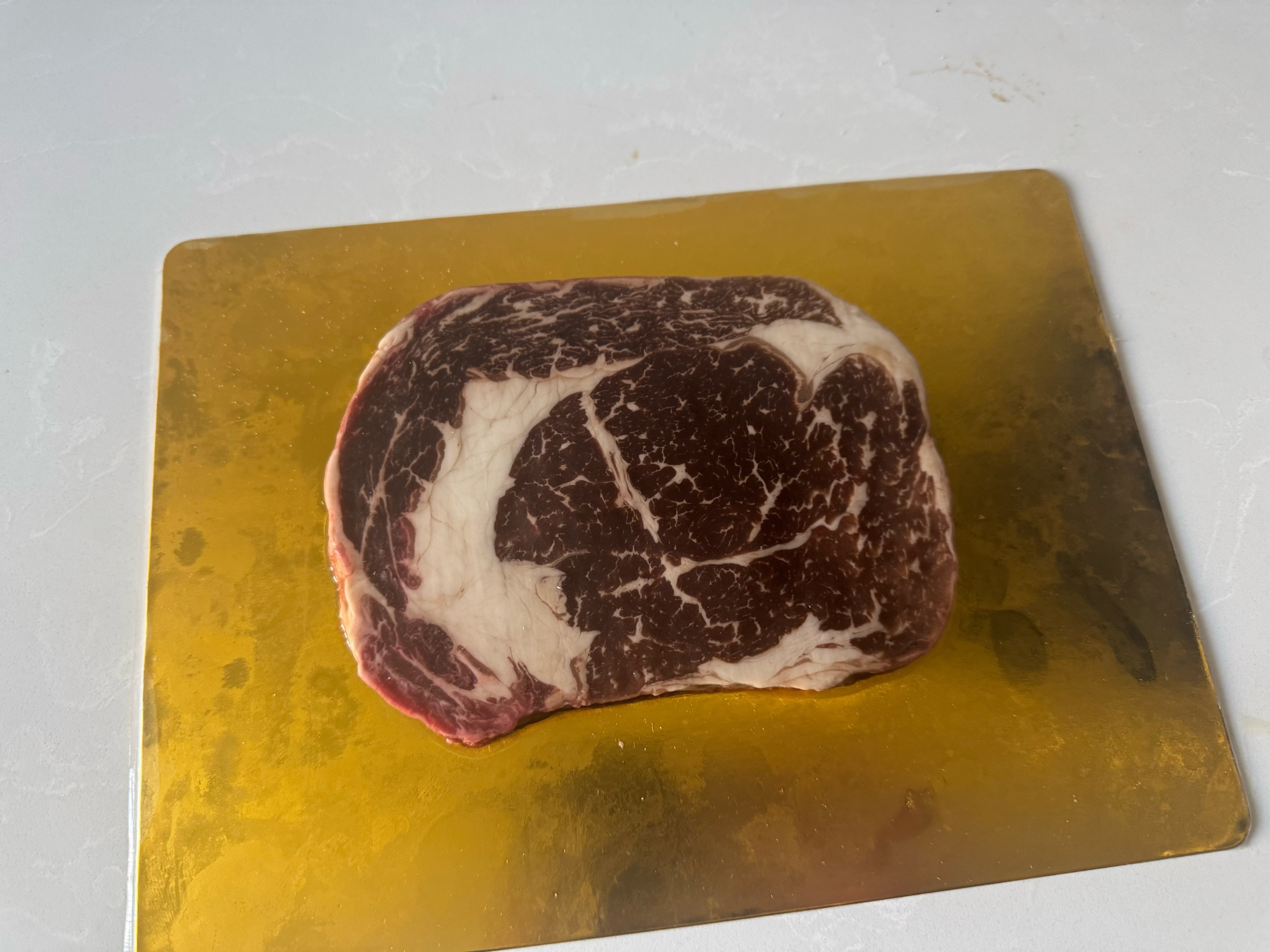 中午媳妇给我炒了个鸡蛋，自己再搞快牛肉。完美。