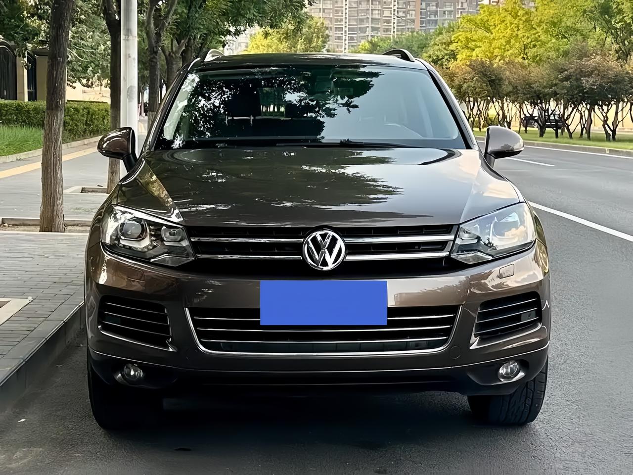 15—20万预算，想买二手途锐3.0T，我觉得它适合不需要车标撑场面的人。途锐