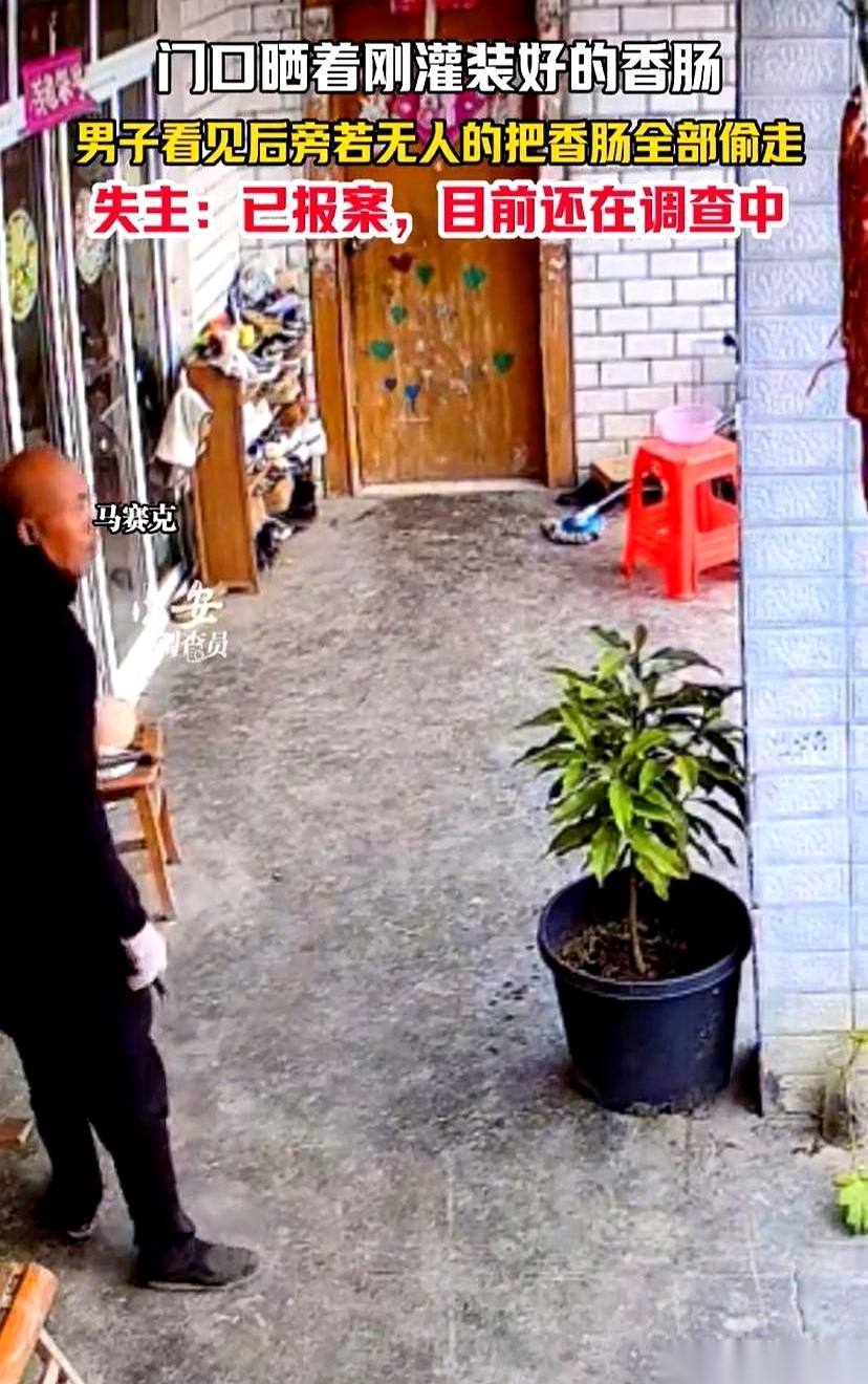 我跟你讲，这世界有时候真的让你看不懂。一个男的，叼着根烟，慢悠悠地搬个板凳，把