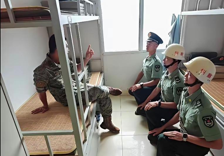 这种场景只能是做梦的时候出现在梦里的吧，坐在床上训连长，站在地上踩纠察！