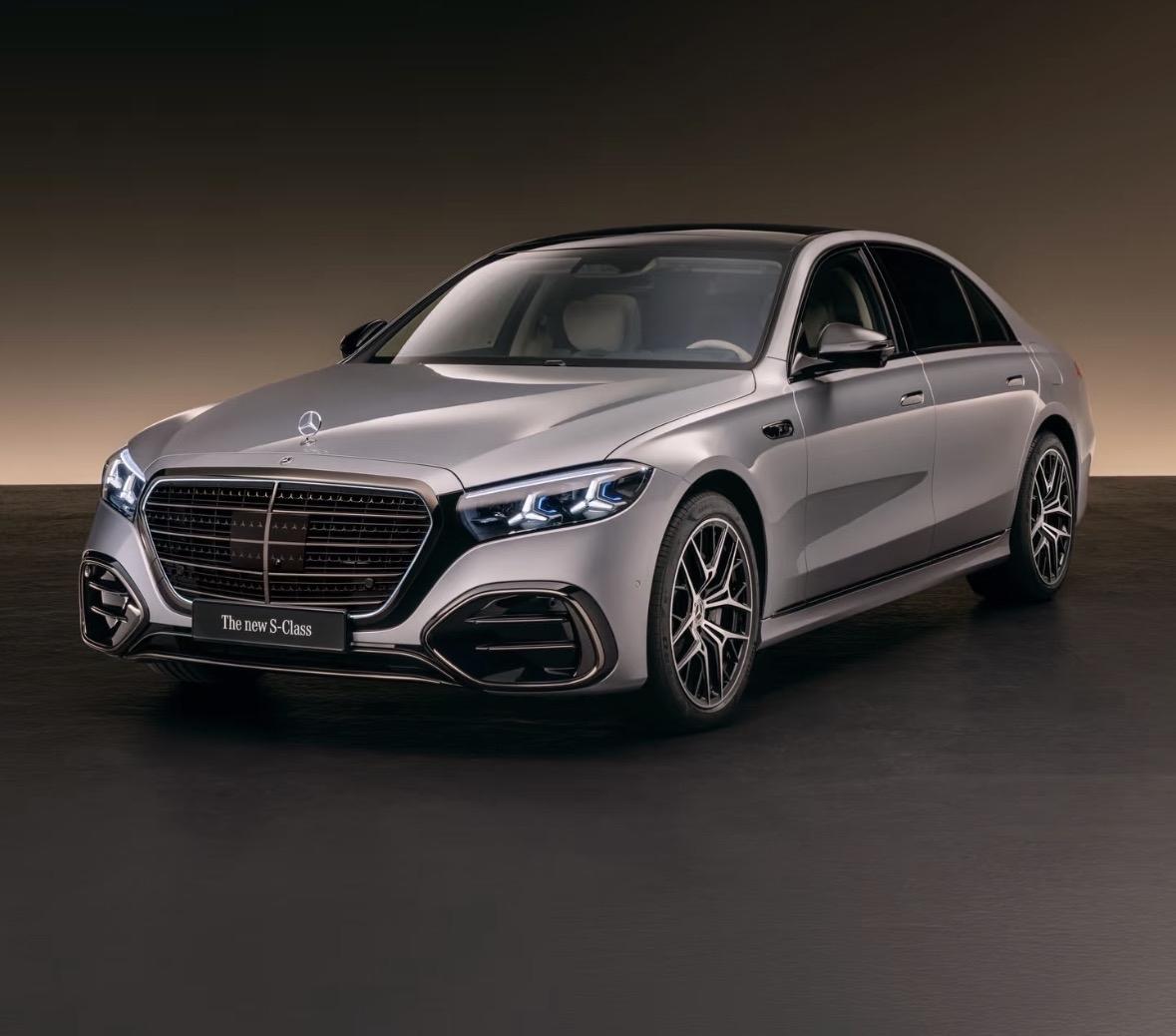 全新奔驰SClass你们看到宝马的大鼻孔变大了，你们说丑，奥迪的大嘴也变大了