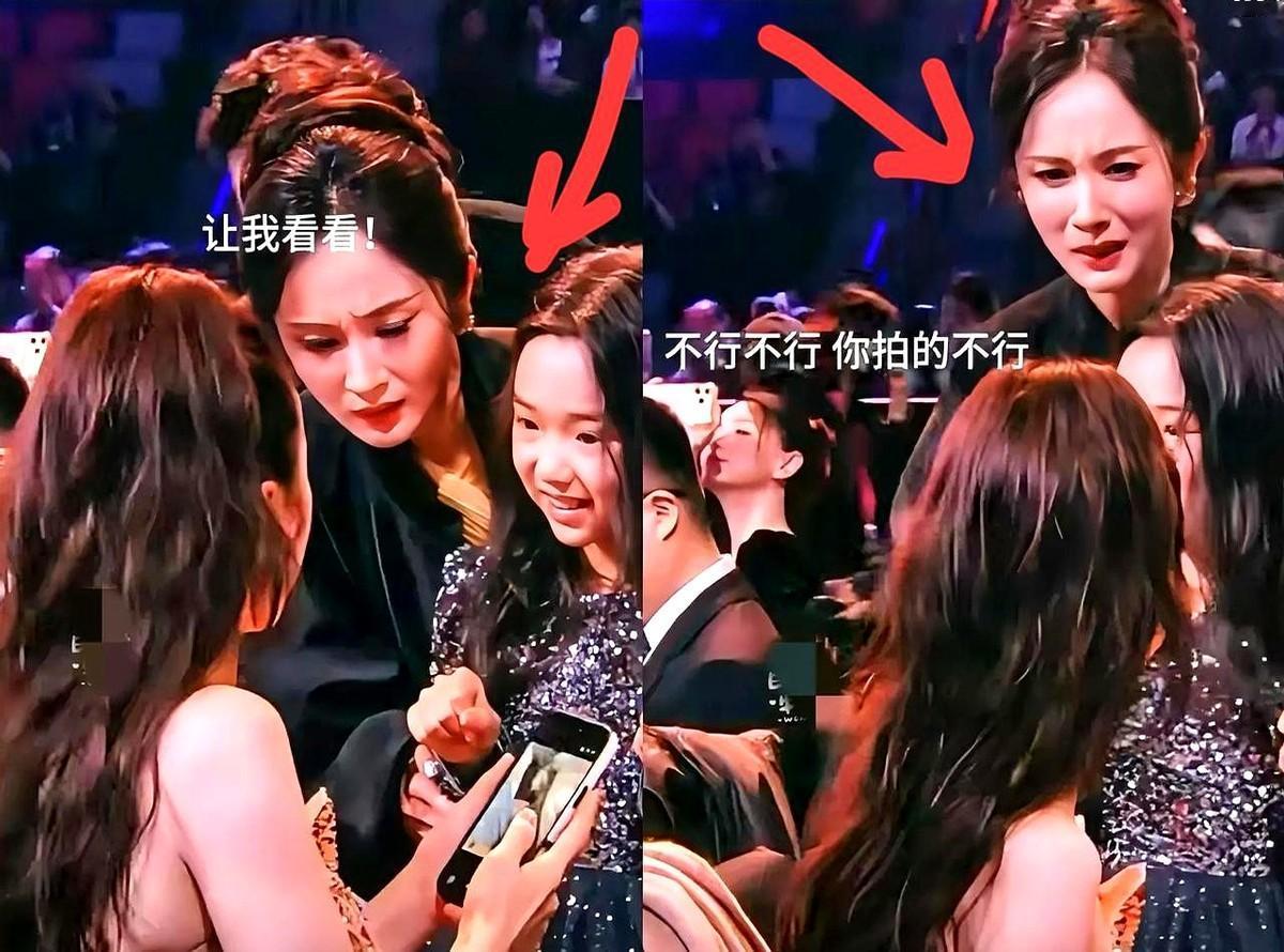 杨幂这个嫌弃脸，真不是装的。尖叫之夜，杨幂搂着董璇女儿小酒窝要合影，让董璇拿