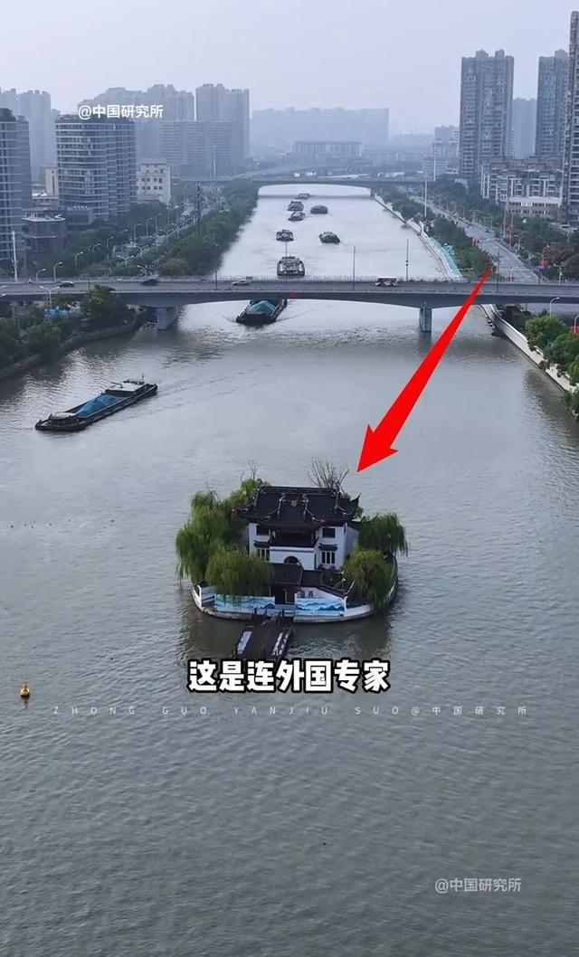 中国研究所。这是连外国专家都无法解释的江苏黄埠墩，只见它孤独的屹立在京杭大运河的
