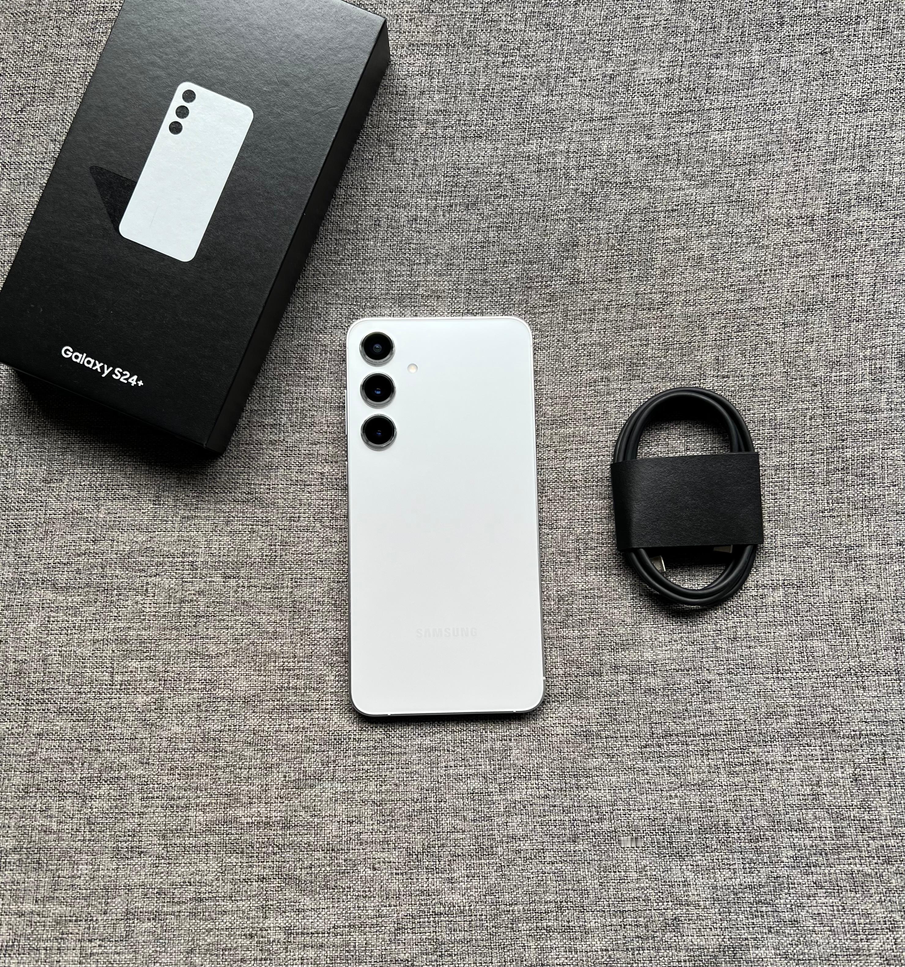 三星S24+12+512G雅岩灰，屏幕完美，中框小磕碰，盒子配件全套，店保三