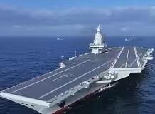 福建舰入列首穿台海7舰9机协同震慑