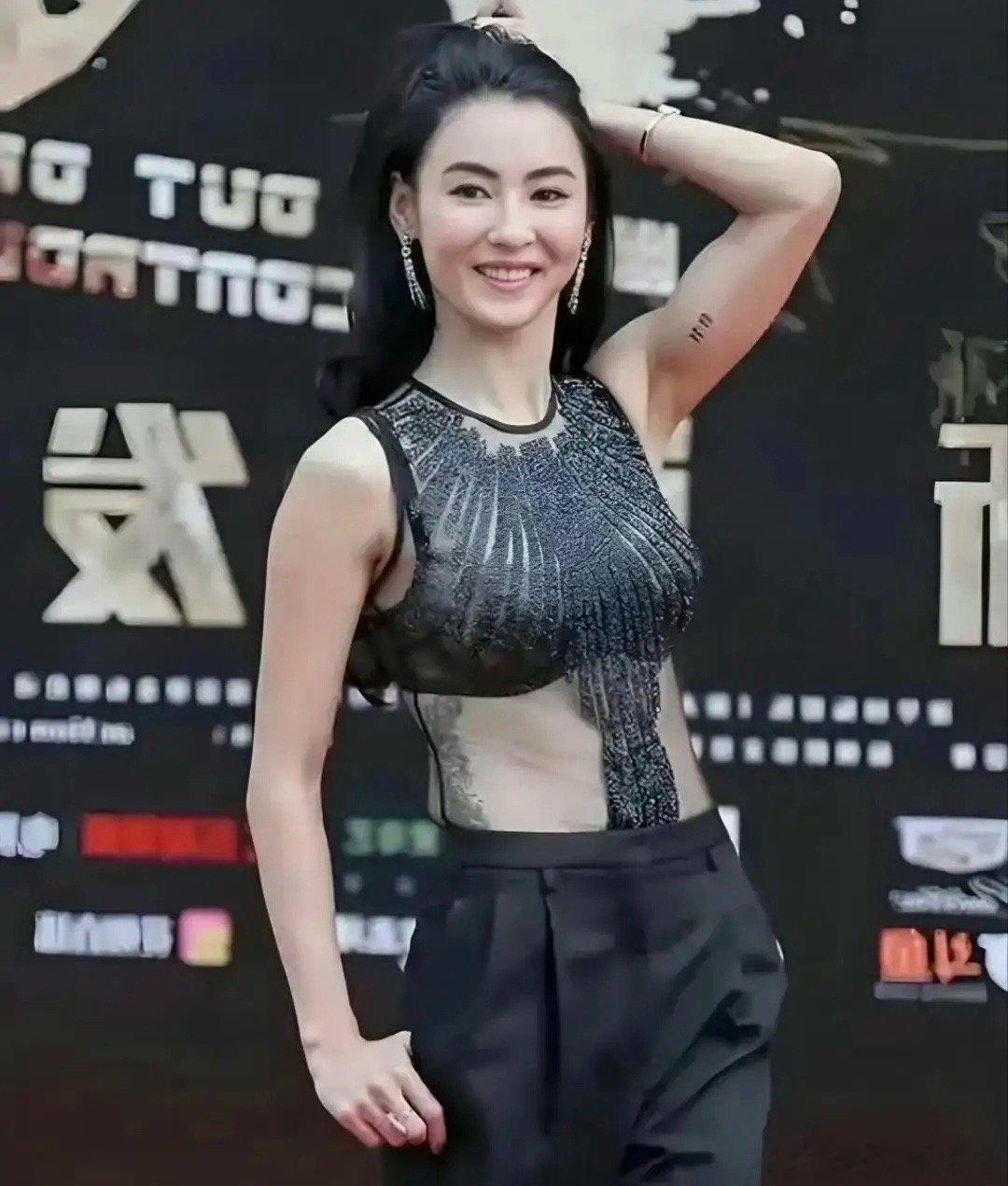 这张柏芝胳膊上纹个11点11是个啥意思？有人知道吗？