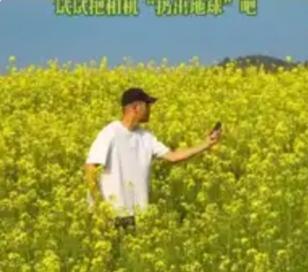 火到央视！广东男子抛相机拍油菜花，失手没接住，却拍出全网封神的春天谁能想到