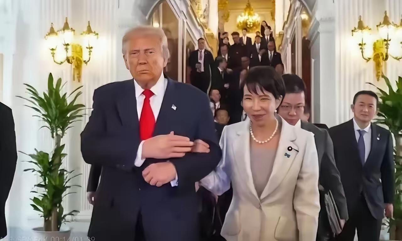 高市早苗签下卖国求荣那份协议时，笑得像朵盛开的菊花。这笑容背后，是日本国家主权的