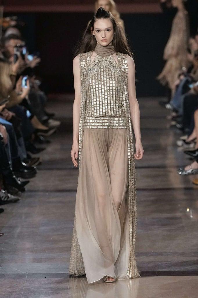 ElieSaab2026春夏高定系列的色彩体系令人眼前一亮。以古铜色和熔金色