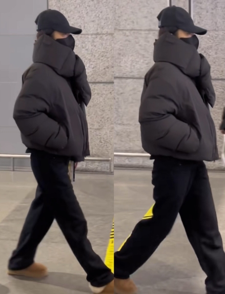 李沁将保暖做到极致，好厚的围巾。李沁机场行走时，穿得是真暖和，跟普通一样棉服加