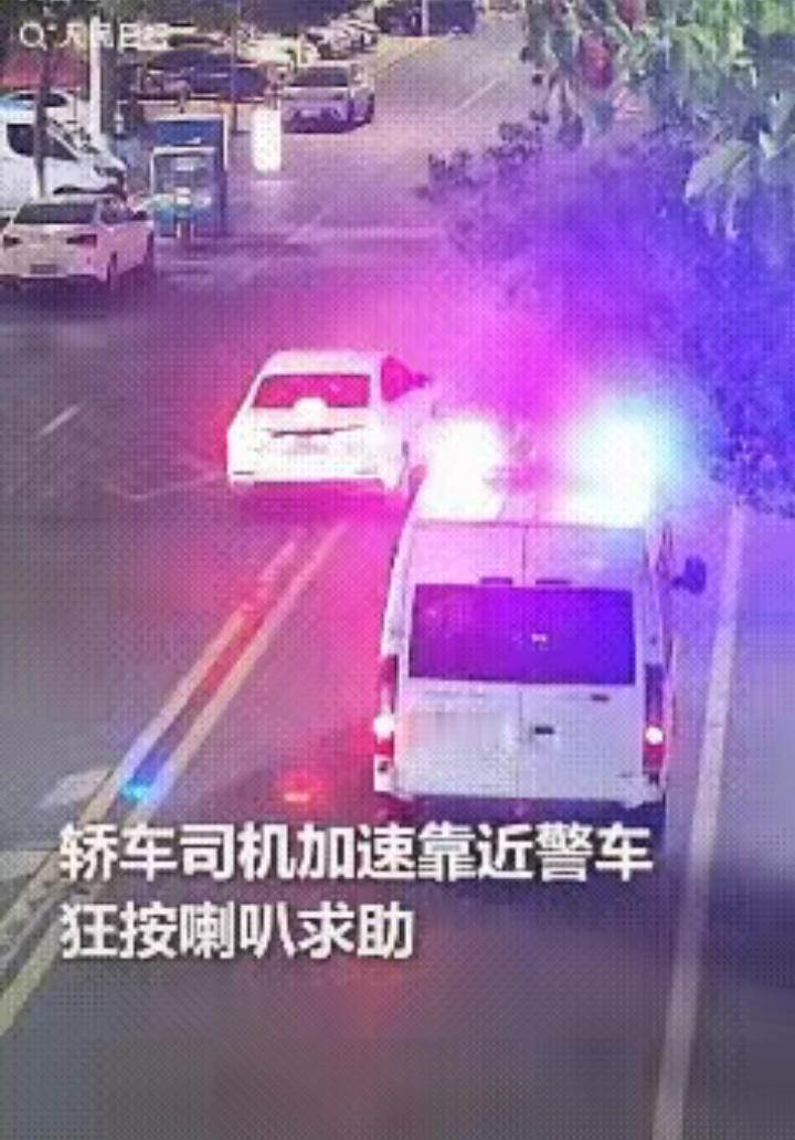 浙江一警车正在巡逻，突然一轿车加速靠近，狂按喇叭将警车截停！民警打开窗户，就听到