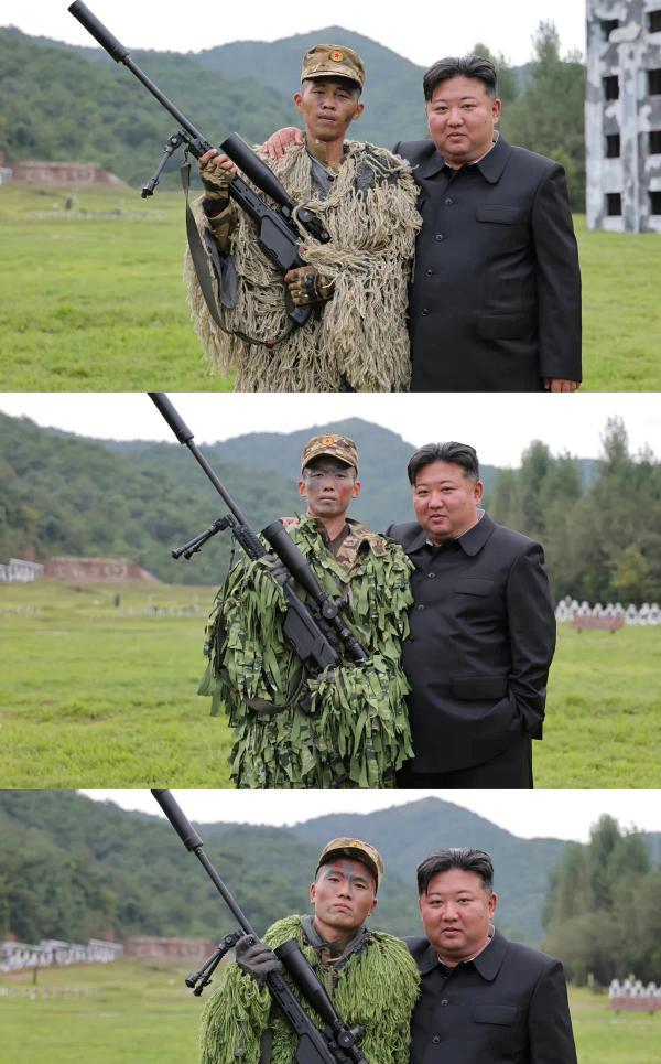 能和伟大的金将军一起合影。应该是这名朝鲜特种兵的无上光荣吧！不过看他手里的这
