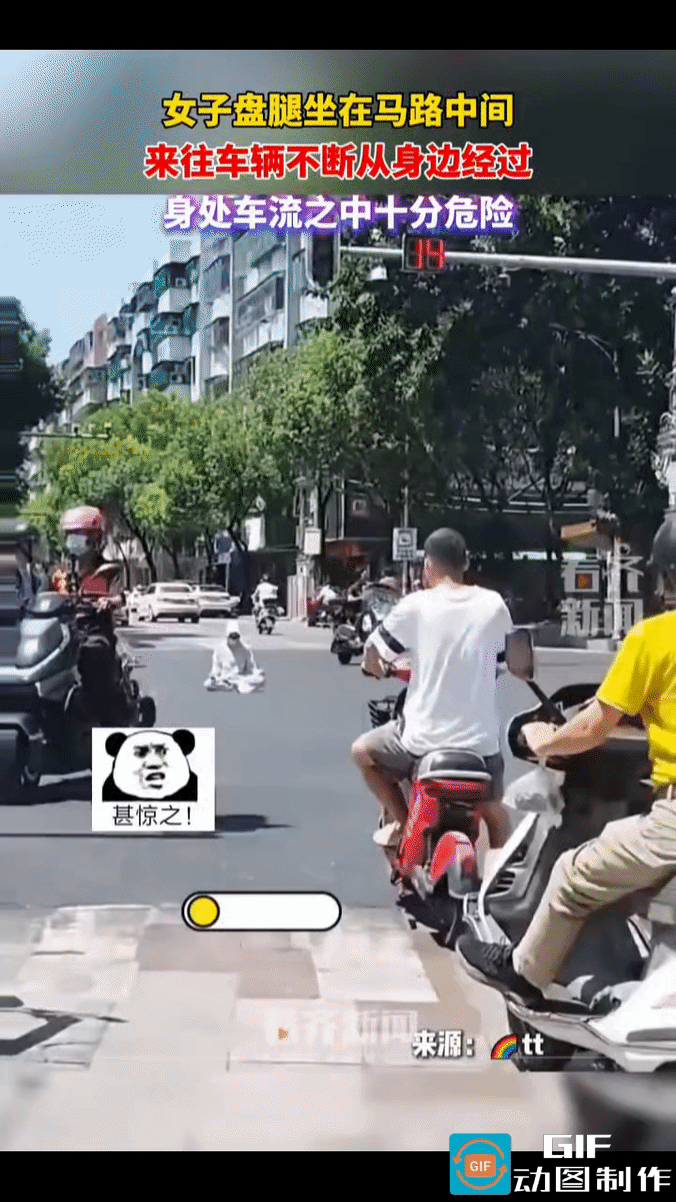 9月15日，广东某地街头，一名身穿防晒服，口戴口罩，全身上下蒙得严严实实的女子，