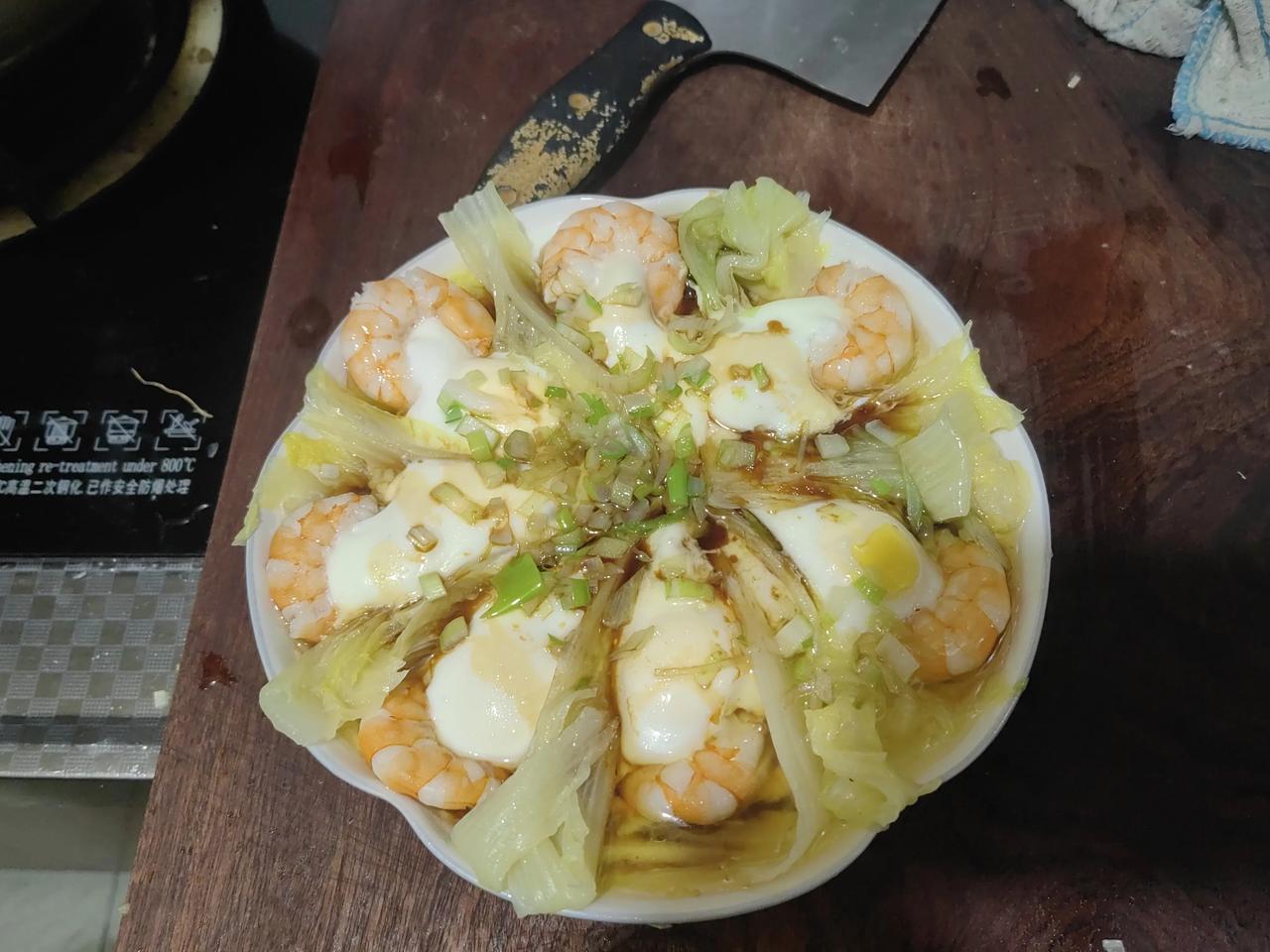 今天晚上老伴做了一个我们全家都不认识的菜。老伴说是从手机上学来的，也忘了这个菜