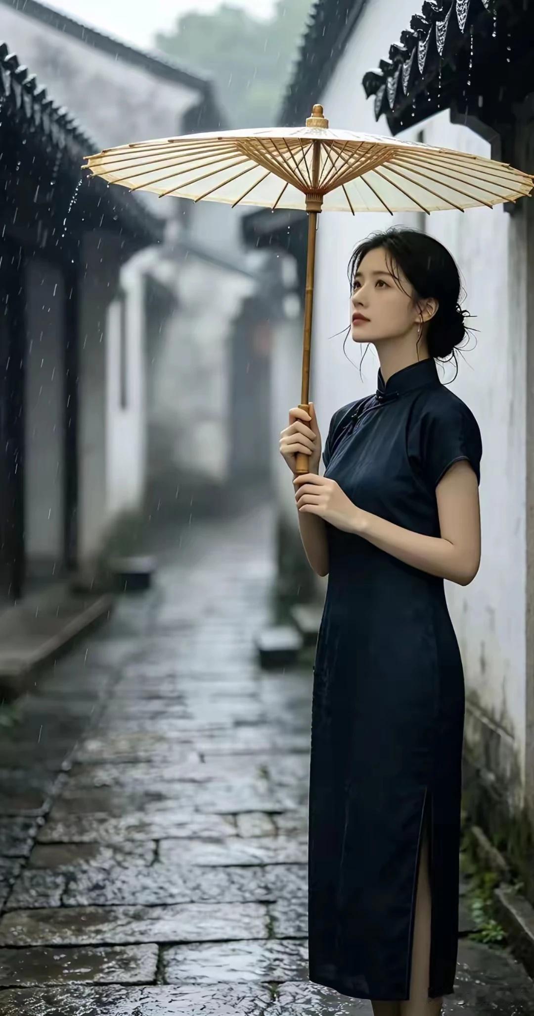 昨夜烟雨洒江南洗尽尘埃柳色新石板古巷苔痕绿白墙黛瓦佳人伞。