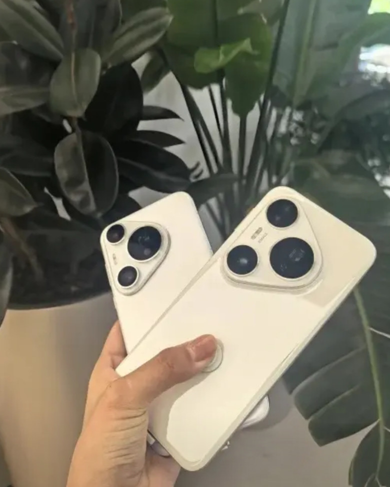 华为设计师的钱真好拿跟Pura70pro相比外观看起来不都是一样的吗？背板