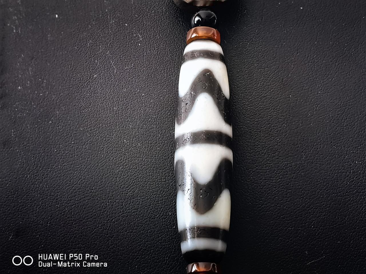 藏传文玩天珠,真有那么神吗?天珠领域有系统的骗局没置，他们有分工合成体系藏汉合一
