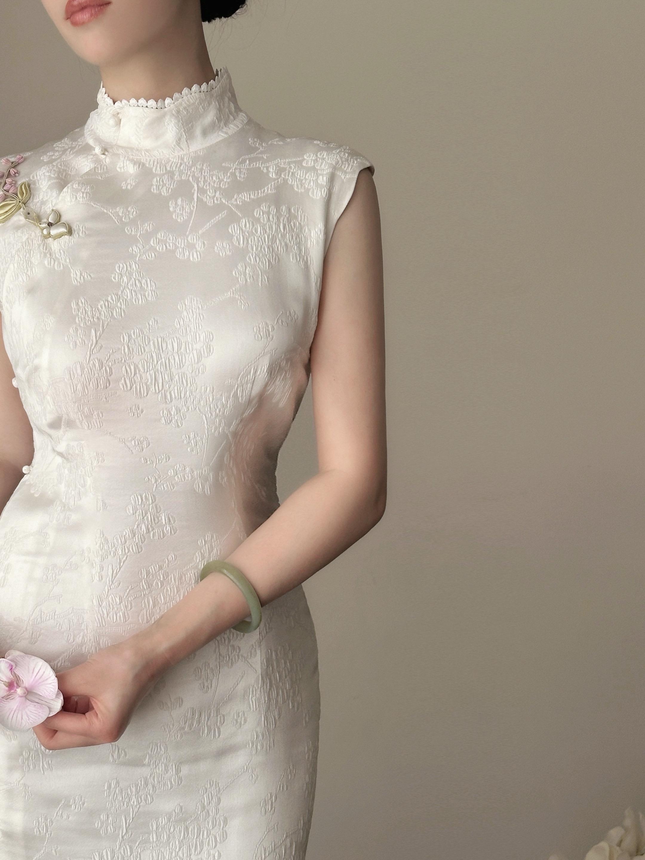 她的旗袍𓍯 𓍯。