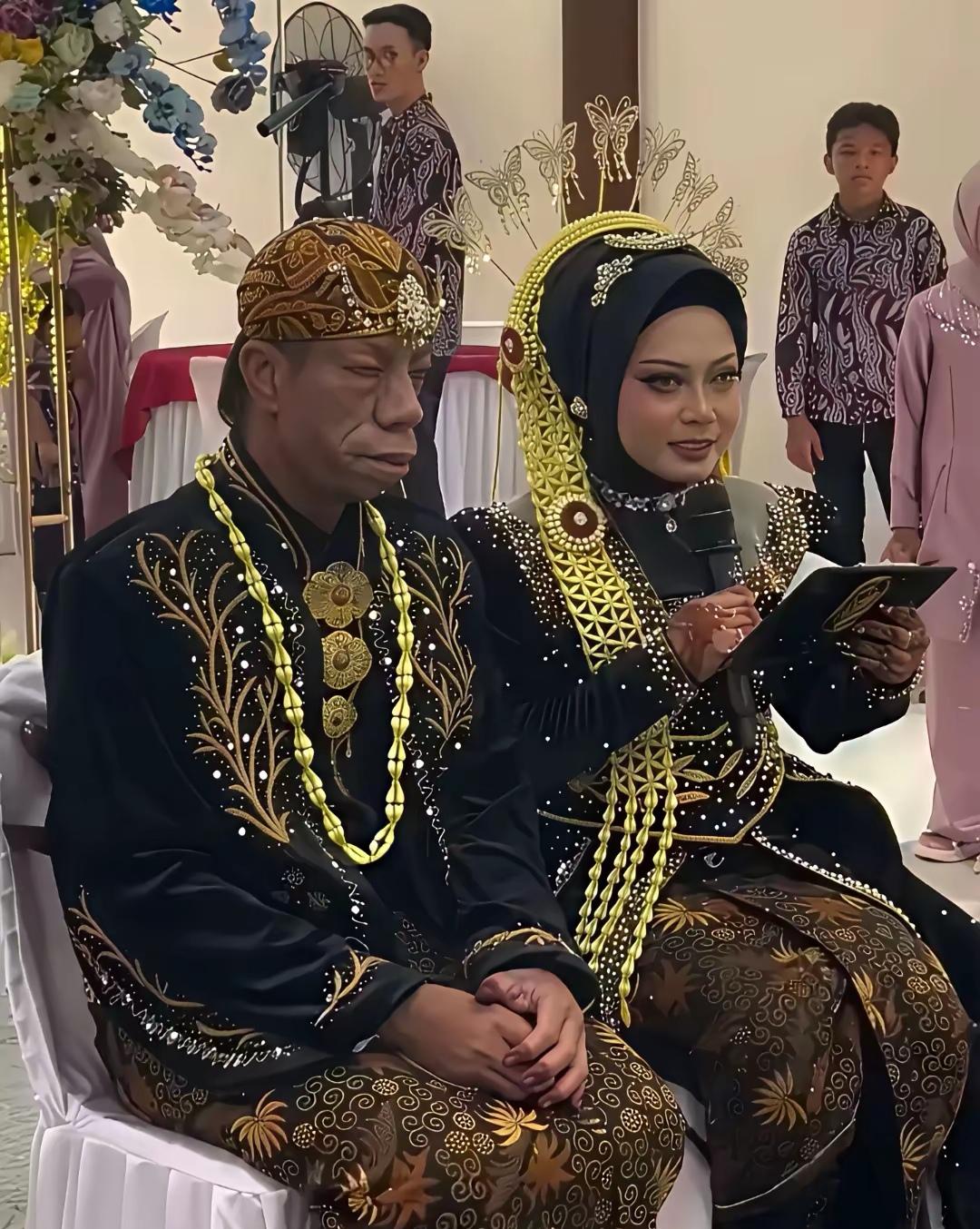 刷到印尼富豪和他妻子的合照，难怪网友说“爱情里的颜值是加分项不是必需项，但加分加