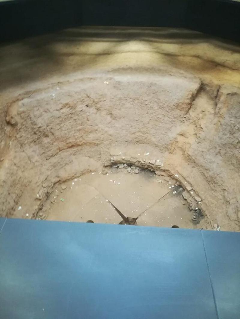 一根木柱，直径约4米，撑起了一座高约90米的建筑。这是1986年考古队在洛阳