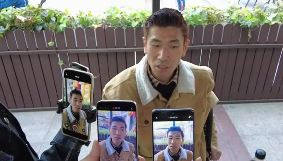 是不是有点上海爷叔的味道了！张半仙出现在上海小公园的时候，已经围满了人群，都是拿