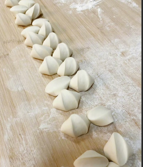 强迫症开始包饺子
