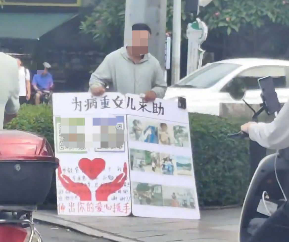 【男子在玉林多个路口从白天乞讨到黑夜】5月15日，玉林市城区街头安全岛上路口都看