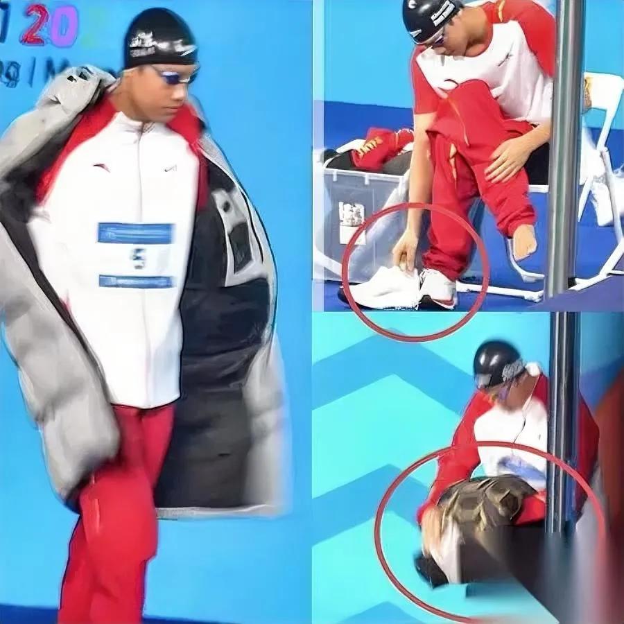 看张展硕脱衣服发现秘密山东人都有这习惯？全运会现场，张展硕下水前脱衣服时